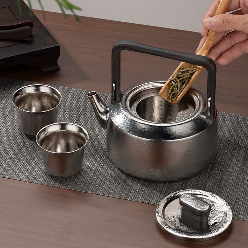 Juego de té de tetera Qiankun de titanio puro Juego de té de tetera Qiankun de titanio puro